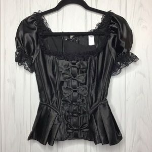 Black lace up corset with bows in front